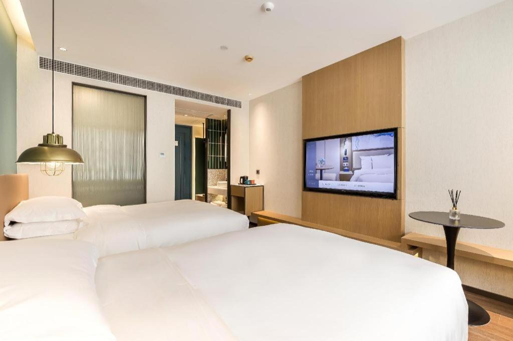 Jinglai Hotel Шанхай Екстериор снимка